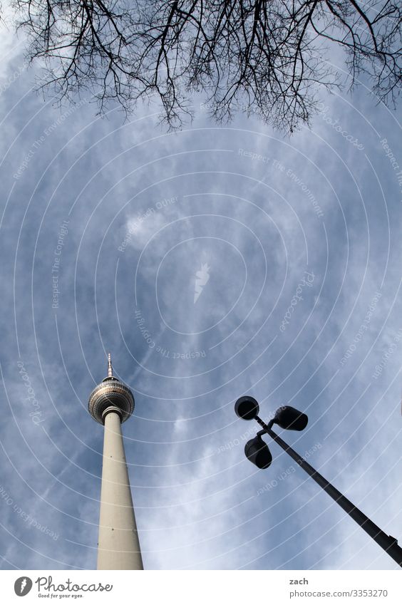 Berlin triad Sky Clouds Beautiful weather Town Capital city Downtown Tower Tourist Attraction Landmark Berlin TV Tower Television tower Large Tall Blue Gray