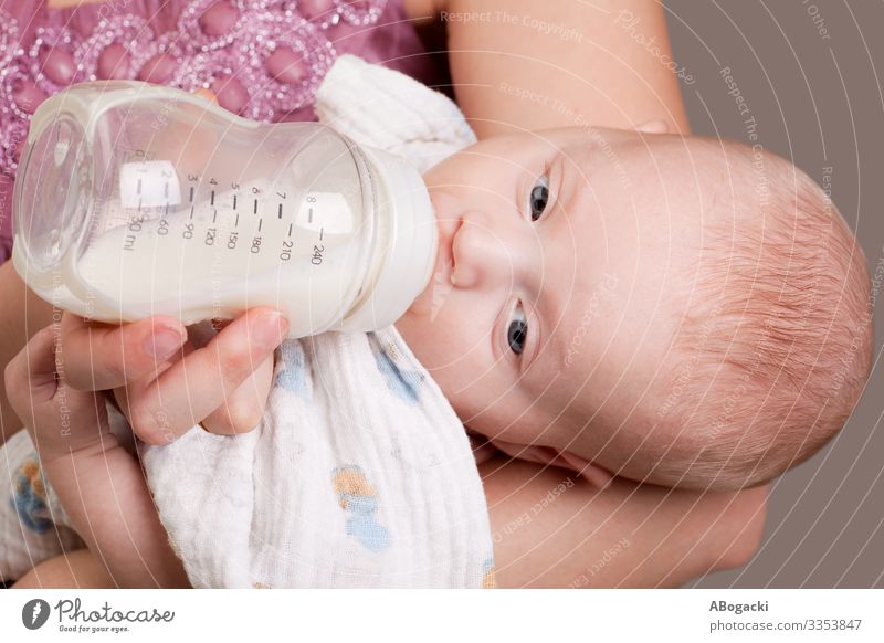 Baby Girl Drinking Milk Nutrition Bottle Beautiful Child Human being Toddler Woman Adults Infancy Cute Soft Appetite Innocent Delightful girl pretty Daughter