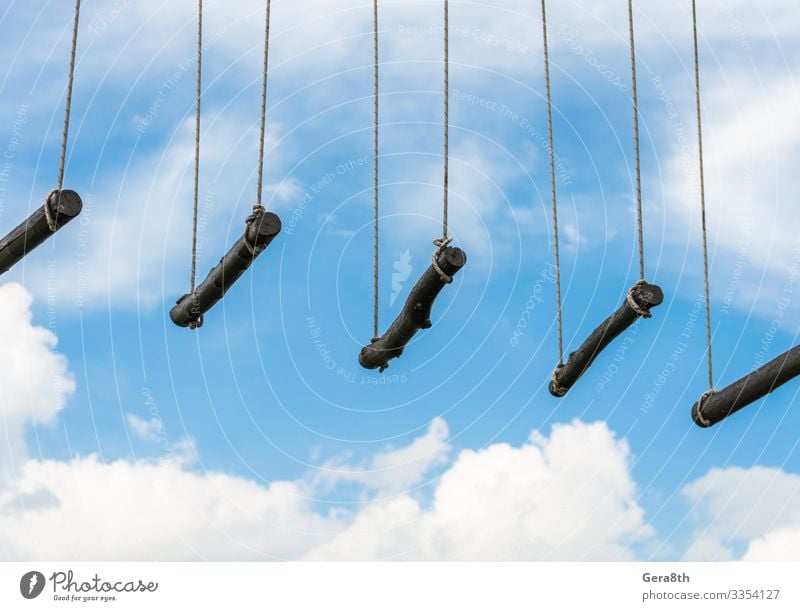 rope ladder against a blue sky and clouds Climbing Mountaineering Rope Sky Clouds Sphere Blue Colour abstract background crossbar empyrean ether footway get up