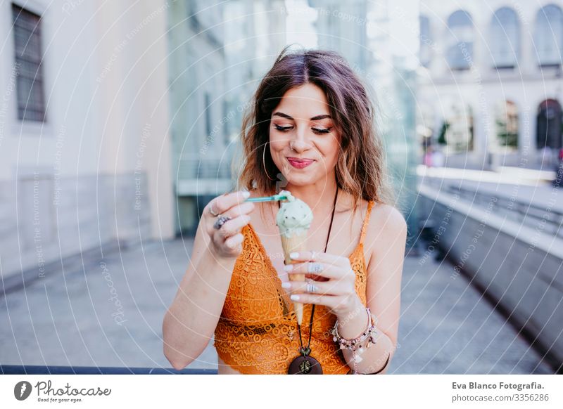 v Day Street Beautiful Woman Sunbeam Cheerful Model Expression gesturing City Happy Emotions Self-confident Smiling Joy Girl Hand Stand Exterior shot Positive