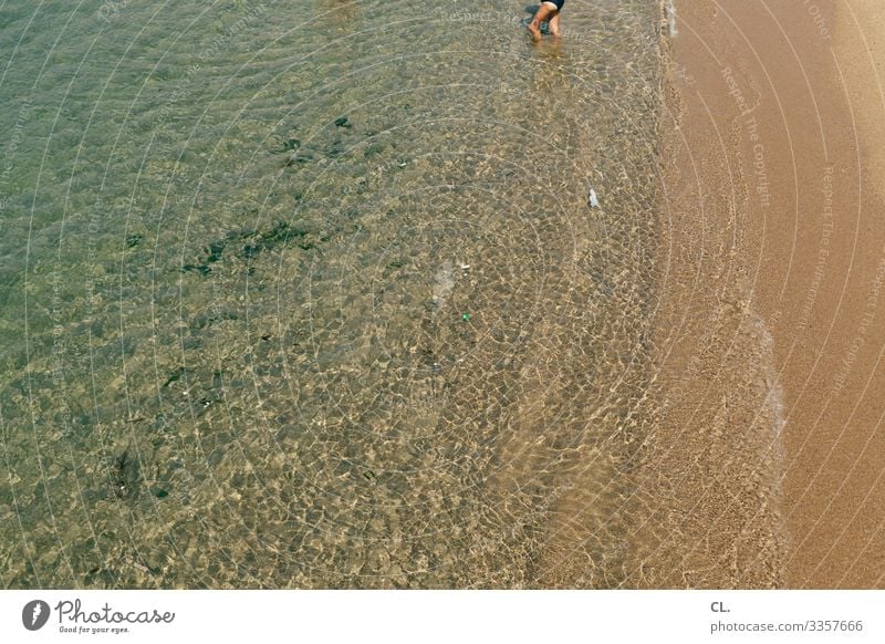 On the beach Water Beach vacation Vacation & Travel Ocean Sun Sand Coast Exterior shot Relaxation Barefoot Summer Colour photo Legs Adults Human being Woman