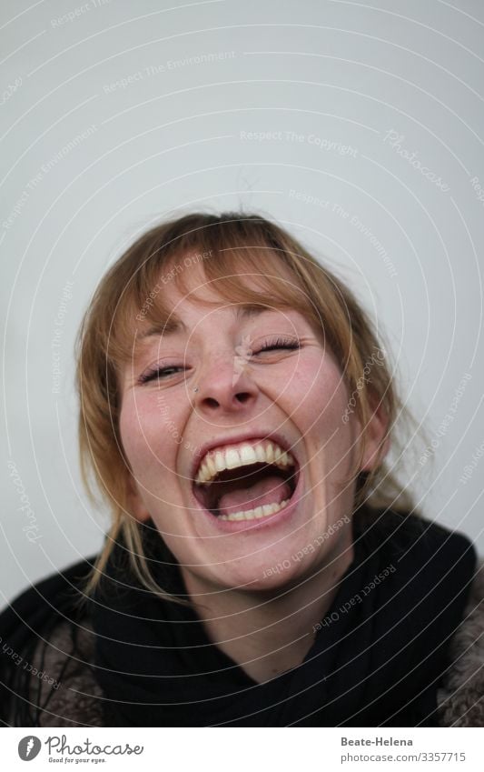 Laughing and crying lie close together: young woman with open mouth lets her emotions run free Young woman Emotions emotionally Mouth open Laughter Cry Energy