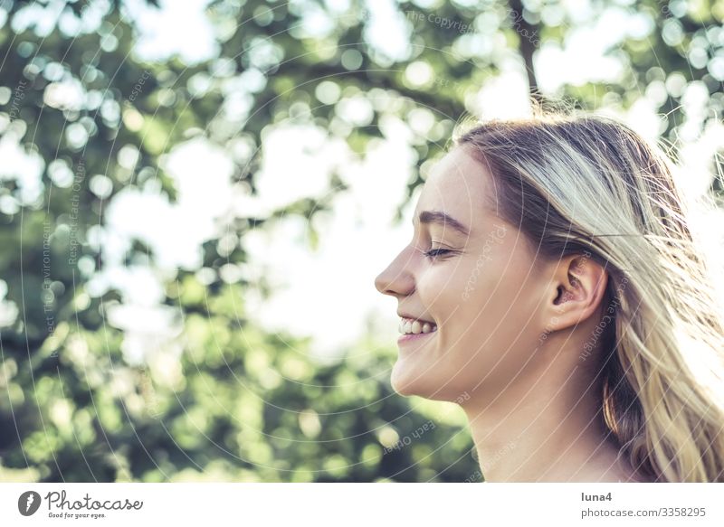 laughing young woman Woman relaxed enjoy glÃ¼cklich cheerfully deceleration Fun sunbathe youthful Young woman left Joy Relaxation time-out Laughter lÃ¤cheln