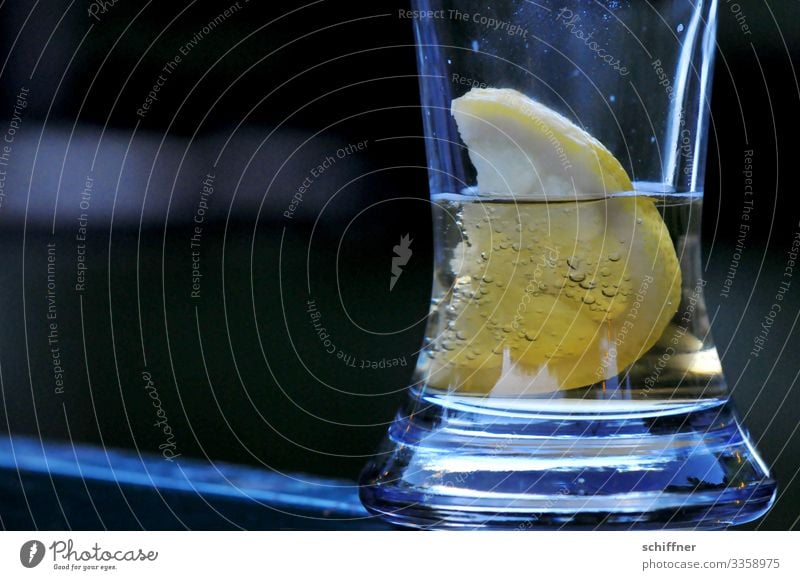 Lemon in an almost empty beer glass Outdoor festival Beer garden Beer glass on the outside Twilight Thirst Thirst-quencher Father's Day