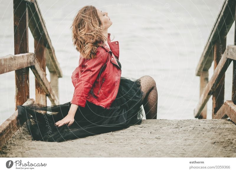 Pensive Young Woman sitting on the floor Lifestyle Elegant Style Beautiful Vacation & Travel Freedom Ocean Human being Feminine Young woman Youth (Young adults)