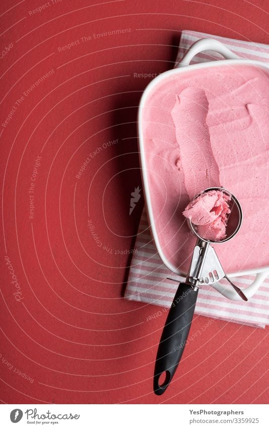 Raspberries ice cream tray with a scoop. Homemade ice cream Dairy Products Dessert Ice cream Italian Food Cool (slang) Fresh Delicious Sweet Pink Red above view