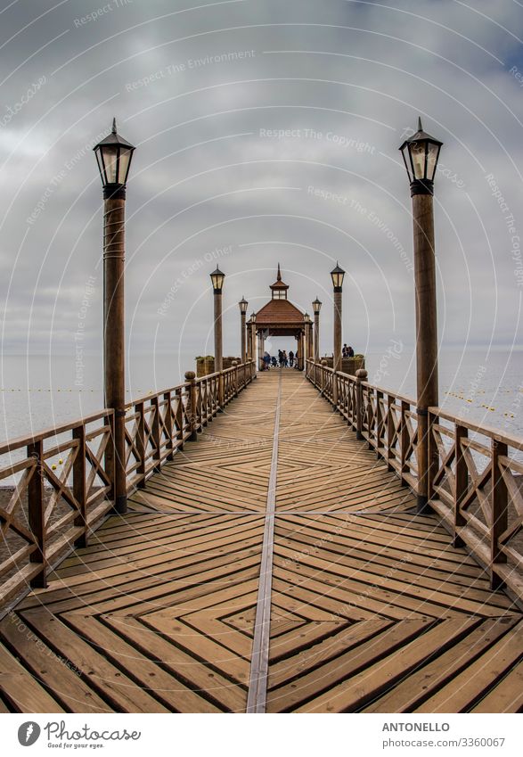 The beautiful wooden pier on Lake Llanquihue in Frutillar Vacation & Travel Tourism Adventure Summer Architecture Air Sky Clouds Storm clouds Bad weather Fog