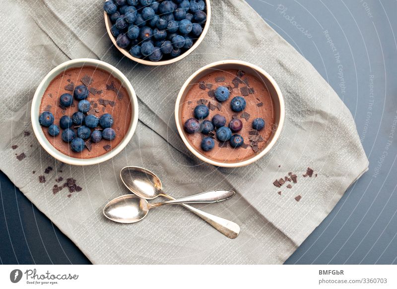 Chocolate dessert with blueberries Food Fruit Dessert Candy Mousse au chocolat Blueberry Nutrition Dinner Buffet Brunch Crockery Bowl Cutlery Spoon