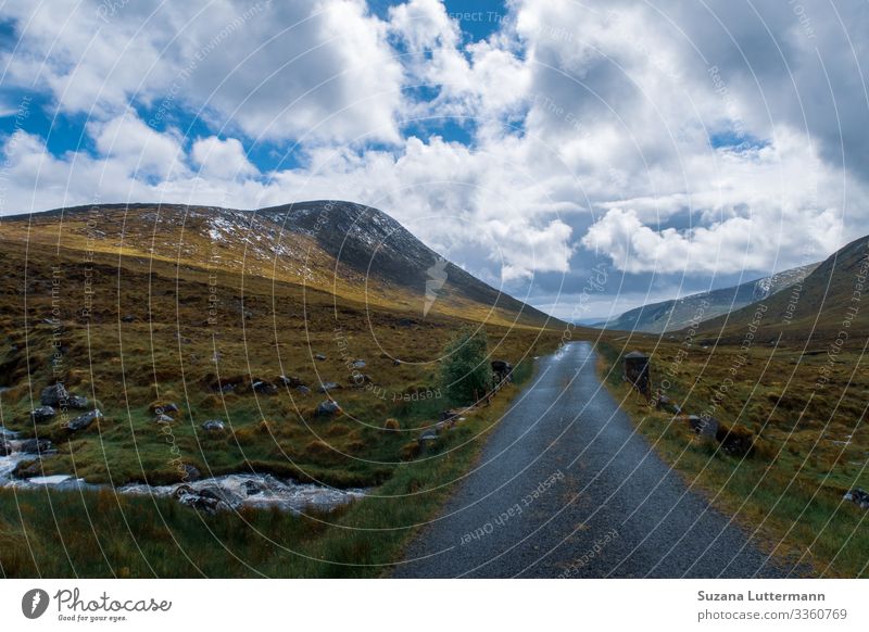 Errigal in Ireland errigal Europe Landscape Clouds Colour photo Exterior shot Rock Sky Deserted Day Nature Copy Space top Hill country