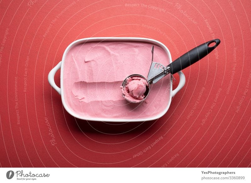 Raspberries ice cream with scoop on red table Food Dairy Products Fruit Dessert Ice cream Cool (slang) Fresh Delicious above view ceramic dish cold colorful