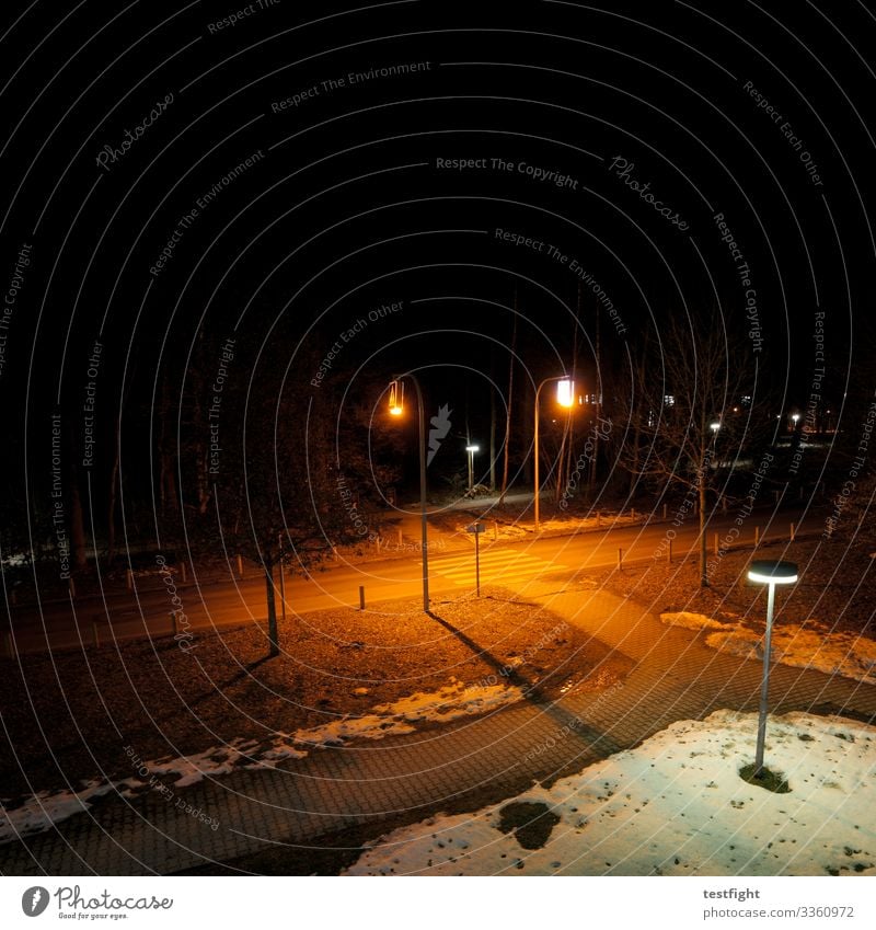 pedestrian crossing Park Town Transport Traffic infrastructure Street Dark Sidewalk Cycle path Night shot Bird's-eye view Lighting Lantern Snow Colour photo