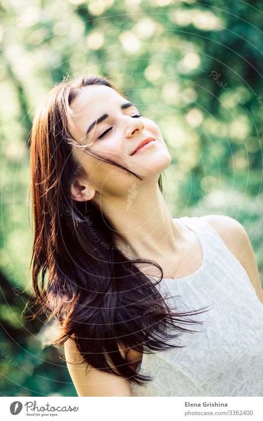 Beautiful girl in a white dress outdoors at sunset Lifestyle Elegant Joy Summer Summer vacation Feminine Young woman Youth (Young adults) 1 Human being