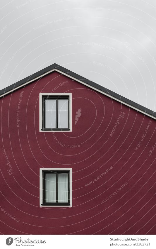 Facade and roof of a dark red house Lifestyle House (Residential Structure) Sky Clouds Town Building Architecture Dark Simple Modern New Clean Gray Red White