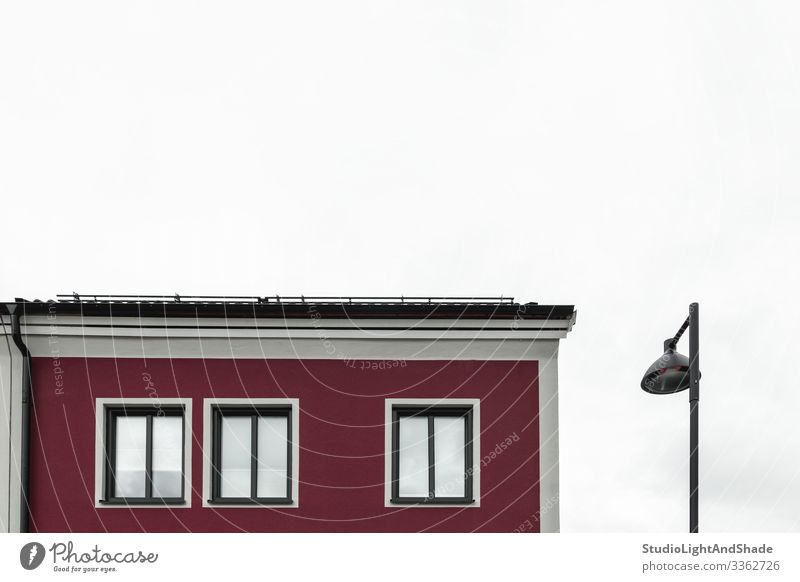 Streetlamp near a modern red building Lifestyle House (Residential Structure) Lamp Sky Clouds Town Building Architecture Facade Dark Simple Modern New Clean Red