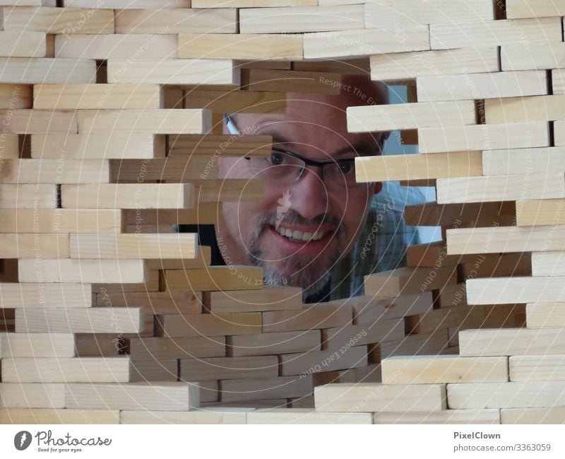 A man looks through a wall Man Human being Eyeglasses Masculine Facial hair Head