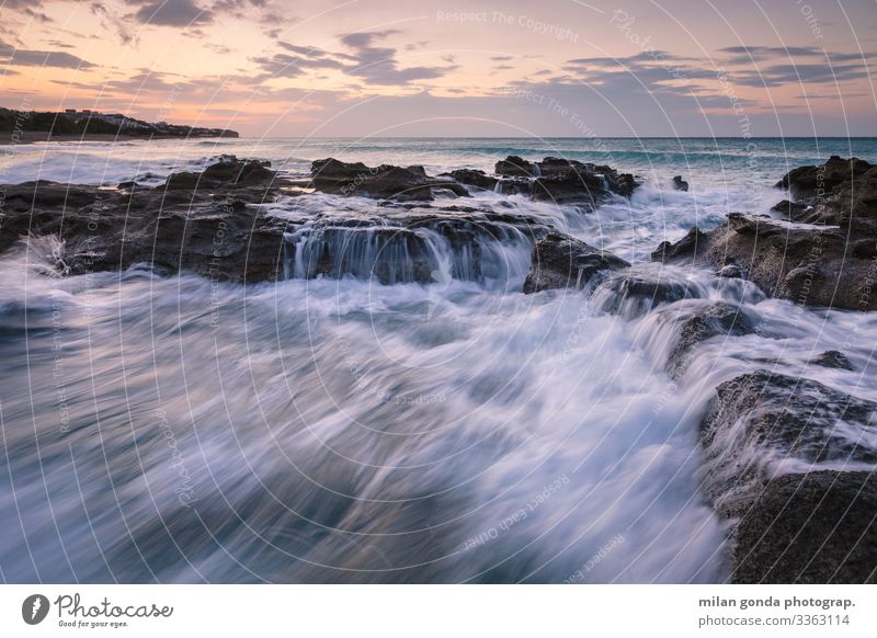 Crete. Beach Ocean Nature Rock Coast Blue Violet Europe Mediterranean Greece Greek Lasithi Ierapetra St. Andrew beach seascape wave Morning Dawn Sunrise Sunset