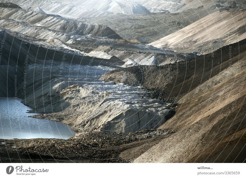 Opencast mining in the Leipzig Neuseenland open pit mining Soft coal mining Coal Slagheap Bizarre Sparse Gloomy Interesting Hill Mountain Lake crater landscape