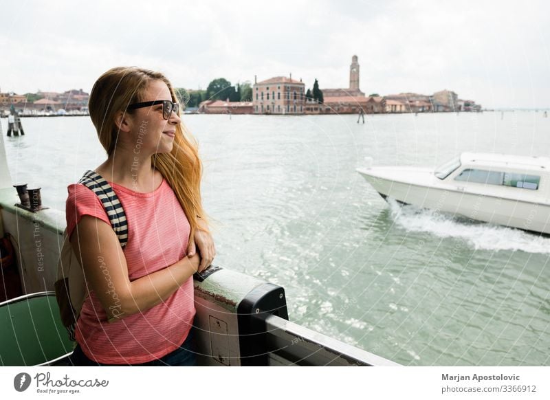 Young female traveler on the tour boat in Venice, Italy Lifestyle Vacation & Travel Tourism Trip Sightseeing City trip Cruise Ocean Feminine Young woman