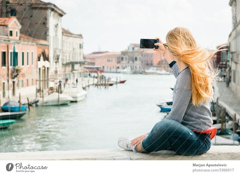 Young woman taking a selfie on the bridge in Venice Lifestyle Vacation & Travel Tourism Trip Sightseeing City trip Cellphone Camera Feminine