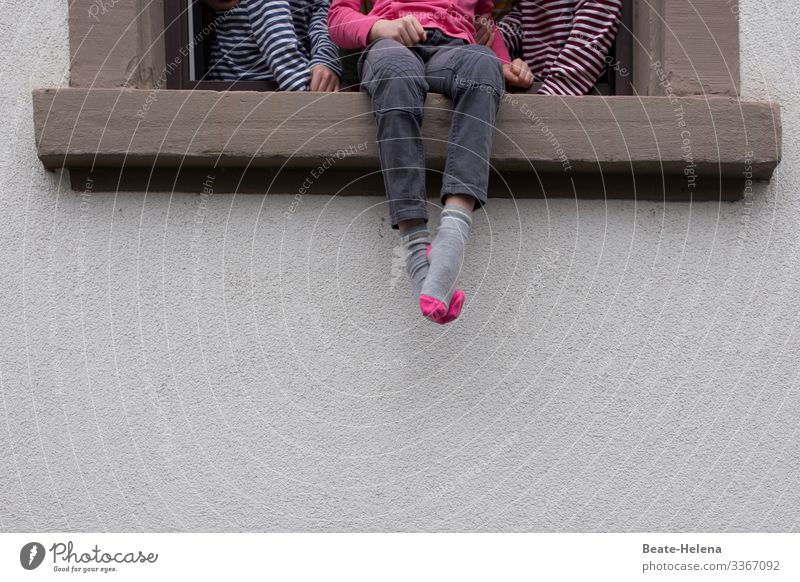 Children sitting at the open window Window Open Windowsill children Colour photo Exterior shot House (Residential Structure) Window frame Facade Window board