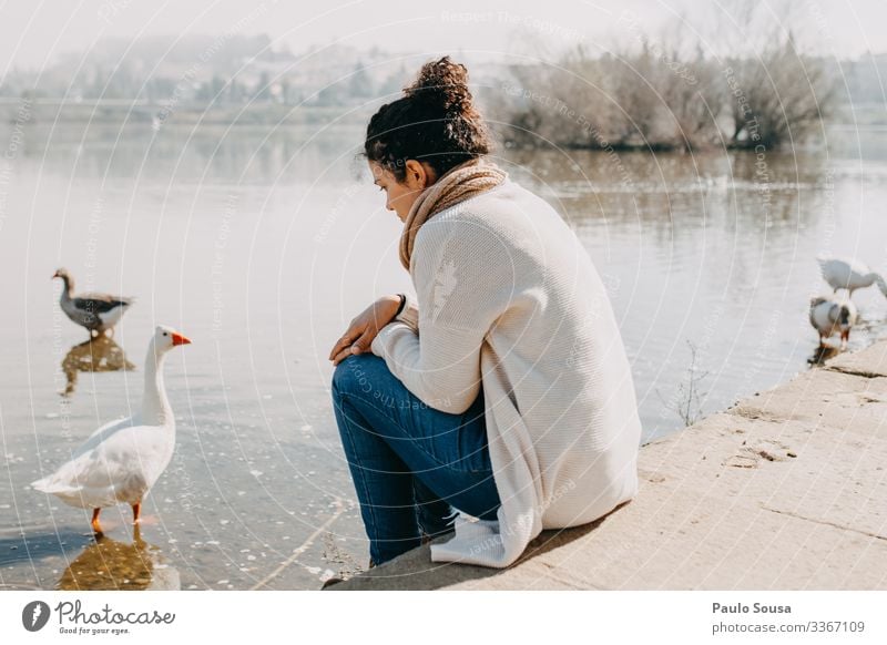 Woman thinking by the river Lifestyle Human being Feminine 1 18 - 30 years Youth (Young adults) Adults Environment Nature Lake Observe Think Vacation & Travel