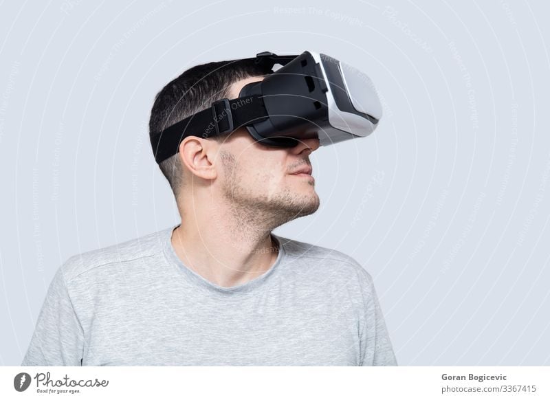 Young man using vr headset, experiencing virtual reality Leisure and hobbies Playing Entertainment Headset Technology Human being Youth (Young adults) Man