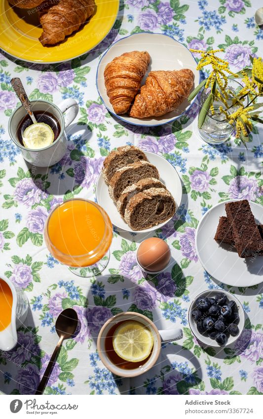 Homemade full breakfast in sunlight coffee background beverage brunch ingredient healthy espresso bread traditional home restaurant tea drink sunny croissants