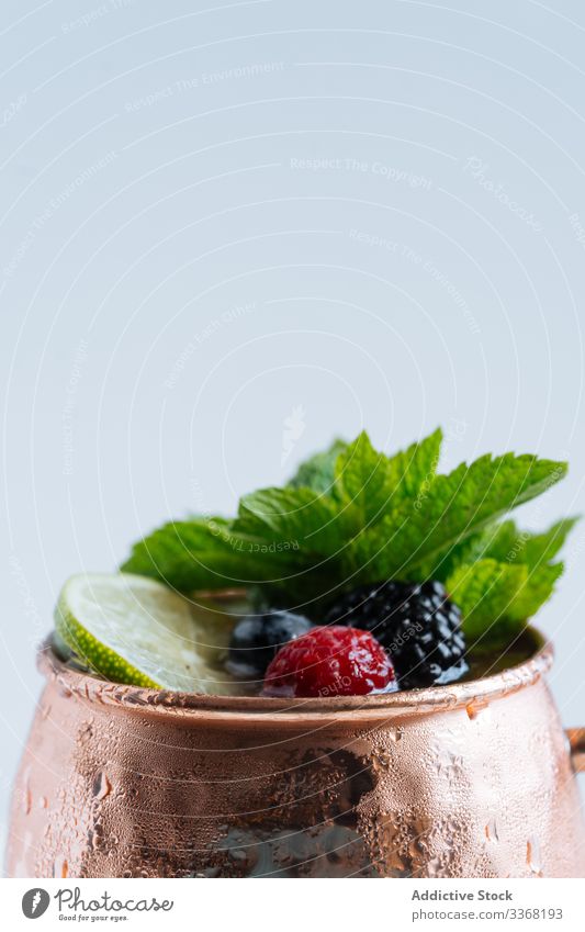 Fruit beverage with fresh mint drink fruit mug berry lime cocktail summer punch tropical cup organic natural herb blackberry blueberry raspberry leaf portion