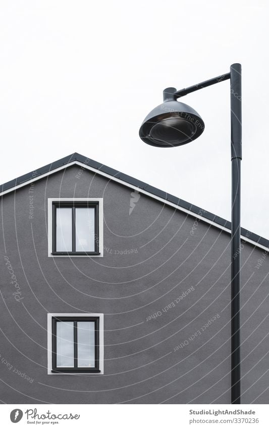 House with two windows and streetlamp House (Residential Structure) Lamp Town Building Architecture Facade Street Simple Modern New Gray roof Europe European