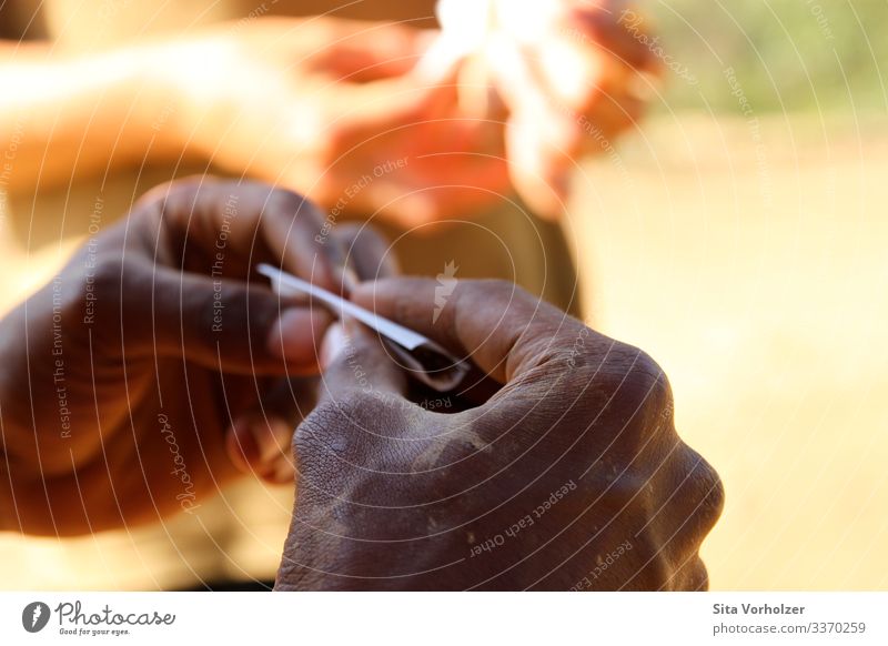 Rolling a cigarette Smoking Masculine Young man Youth (Young adults) Hand 2 Human being 18 - 30 years Adults Summer Rotate Moody Serene Patient Calm Addiction