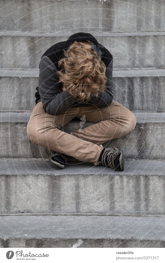 life breaks | little boy sits very sad with his hands in front of his face crying on a staircase Child Boy (child) Cry by oneself Grief Concern Fear loss