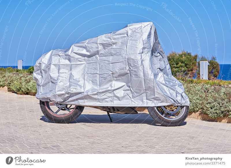 Waterproof cover for motorcycle with silver surface Vacation & Travel Tourism Sun Engines Landscape Weather Rain Park Transport Street Vehicle Motorcycle