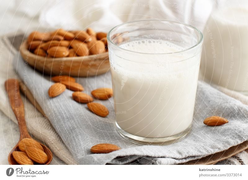 Vegan almond milk, non dairy alternative milk Vegetable Nutrition Breakfast Vegetarian diet Diet Beverage Spoon Fresh Natural Alternative almonds Vegan diet