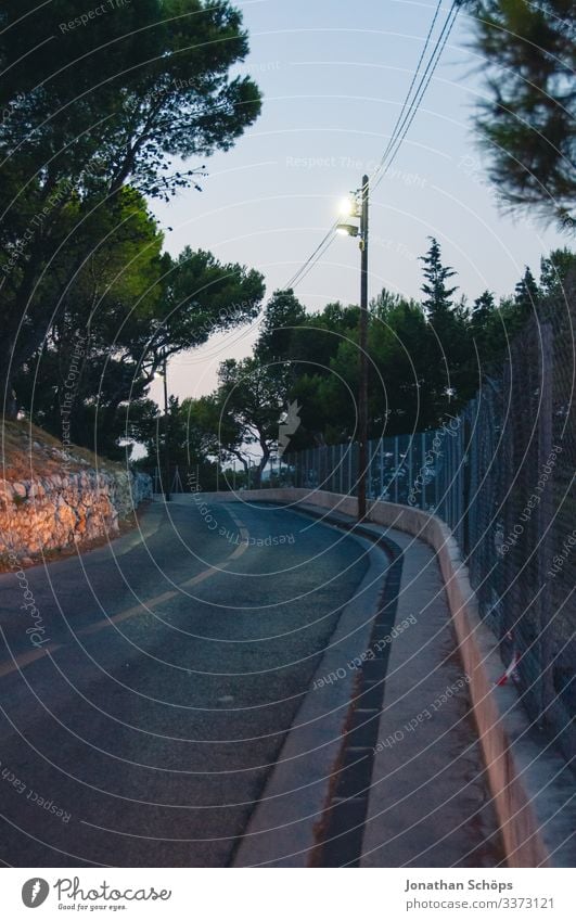 Street at dusk in Marseille Deep depth of field Contrast Twilight Light Deserted Evening Exterior shot Summer evening Colour photo Ski-run Warmth Tourism Empty