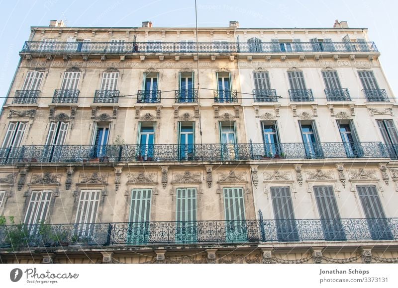 House facade in Marseille Deep depth of field Sunlight Contrast Exterior shot Light Worm's-eye view Deserted Esthetic Old Window Balcony Facade