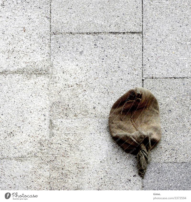 cute little sandbag, which was forgotten during the clean-up work after the last flood and is now very lonely Sandbag Bird's-eye view Street Pavement slabs