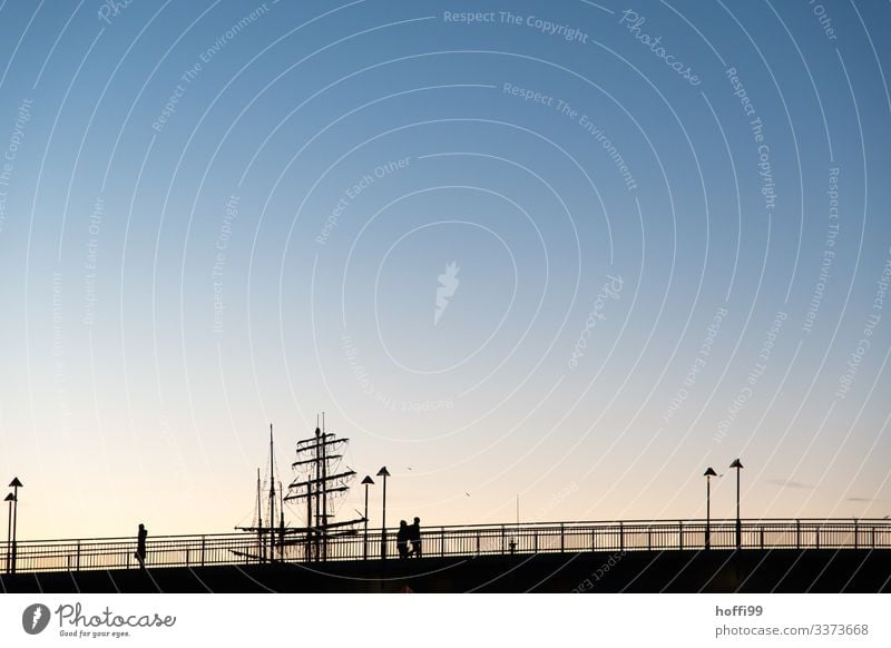 Silhouette of bridge, man and ship in the morning light people Sailing ship three-master Sunrise Sunset Sunrise - Dawn sunrise Morning Sky Light Nature