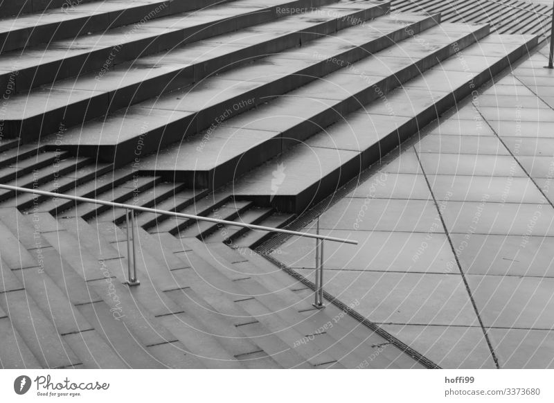 monotonous staircase landscape in the rain Long shot Central perspective Shadow Light Morning Structures and shapes Pattern Abstract Detail Exterior shot