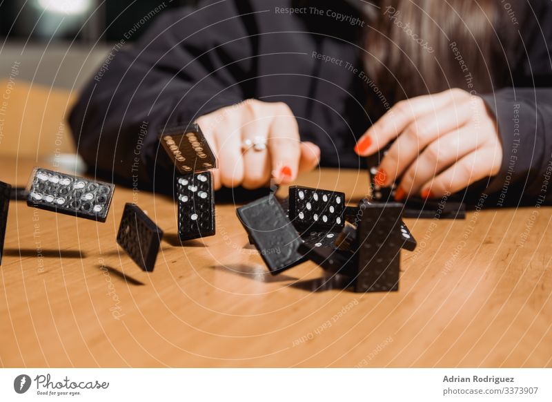 The wooden domino blocks falling down Playing Game of cards Poker Lottery Business Shopping Crash Effect Balance failure gambling strategy casino Downward