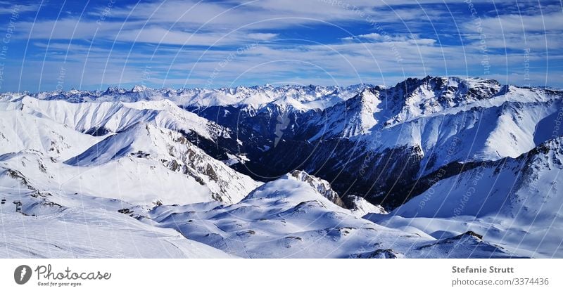 sea of peaks in the snow Panorama (View) Light Deserted Movement Far-off places Snowcapped peak Mountain Nature Landscape Sky Alps skis Ischgl Summit Paradise