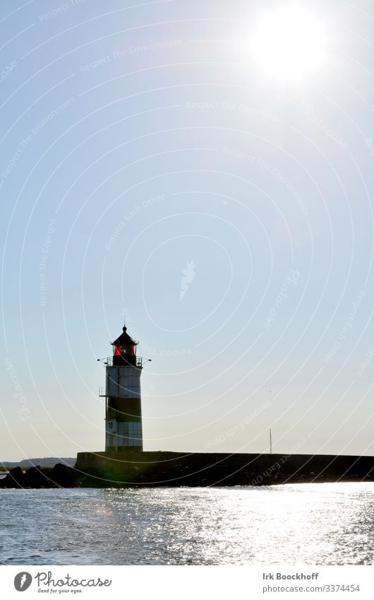 lighthouse Lighthouse Navigation mark Back-light Colour photo Exterior shot Coast Day Deserted Orientation Blue Wanderlust Copy Space top Sky Loneliness