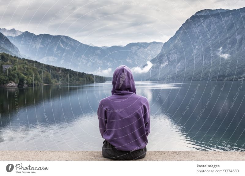 Sporty woman watching lake Bohinj, Alps mountains, Slovenia. Lifestyle Beautiful Relaxation Vacation & Travel Tourism Mountain Human being Woman Adults