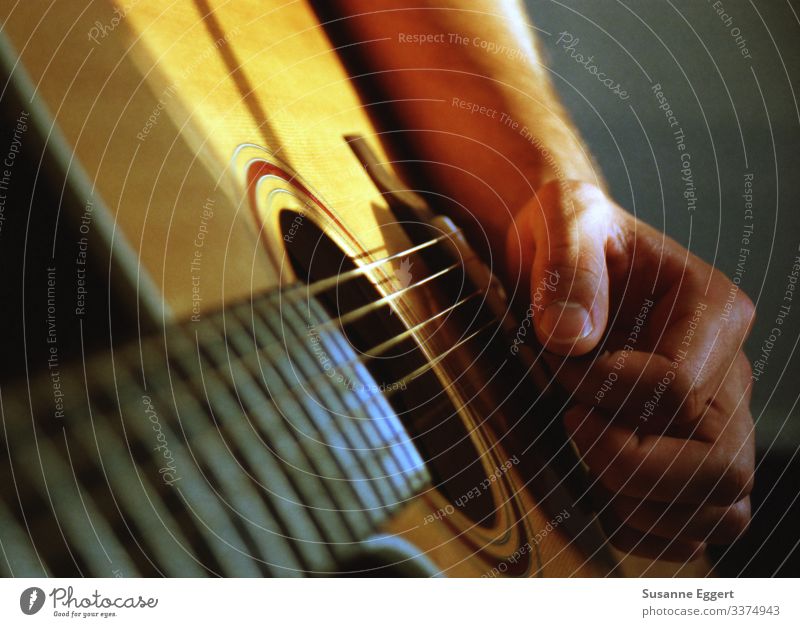 make music Hand Fingers Playing Art Music Culture Make music Guitar Plucked instrument Guitarist Guitar neck Guitar string Artist Compose Composer