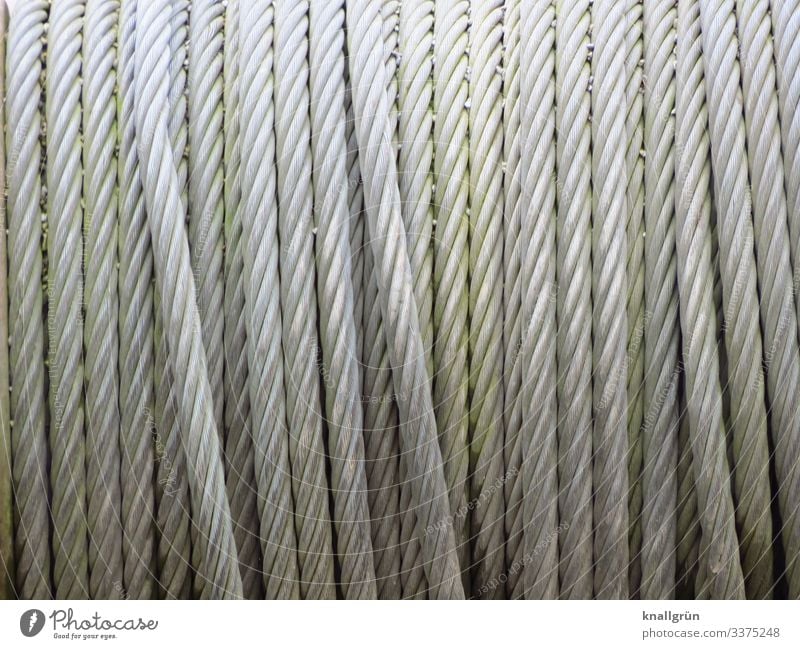 Skew wound Steel cable Wire cable Silver cable drum Coil Wound up Colour photo Exterior shot Deserted Copy Space top Copy Space bottom Copy Space middle Day