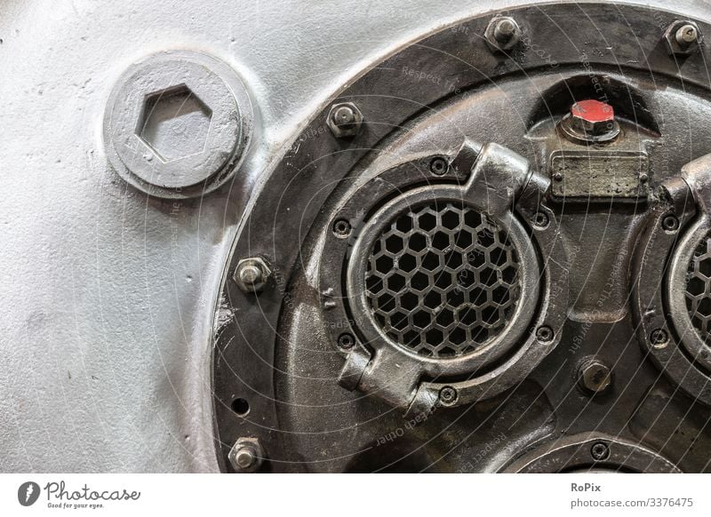 Detail of an old compressor housing. Machinery technique Mechanics machine Gear unit gearing pinion Chain sprocket chain wheel Wheel Gearwheel cogwheel country