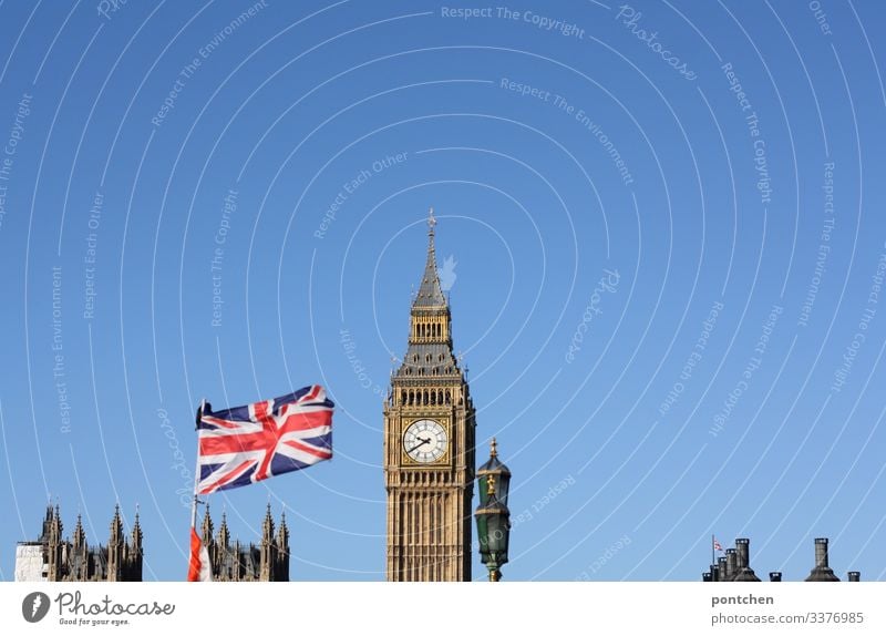 Big Ben and Union Jack flag in front of blue Hinmel Vacation & Travel Tourism Sightseeing City trip London Tower Manmade structures Building Tourist Attraction