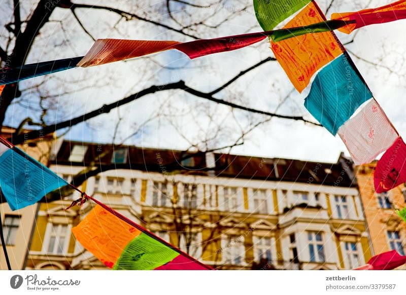 Prayer flags in Schöneberg berln Dalai Lama Flag prayer flag prayer pennant Back-light Deserted religion Sun Town Copy Space Tibet Blow Wind Religion and faith