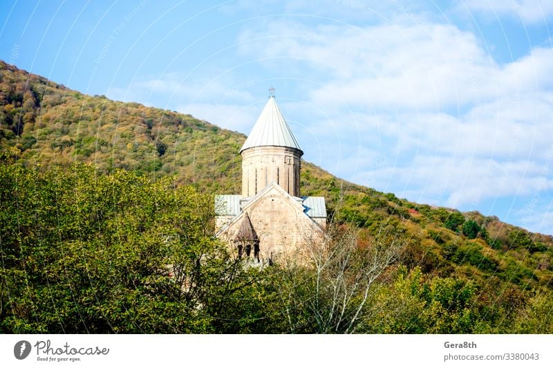 Vacation & Travel Tourism Mountain Nature Landscape Plant Sky Clouds Autumn Tree Forest Hill Church Building Stone Tall Natural Blue Green Religion and faith