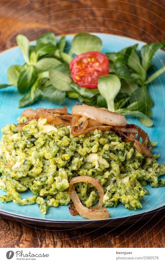 Cheese Dough Baked goods Lunch Dinner Vegetarian diet Plate Table Restaurant Wood Fresh Delicious Spinach Spaetzle spaetzle spaetzle Portion Rustic Lettuce