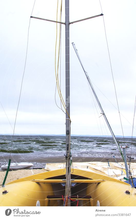 Rope team | hangs out a little bit unmotivated boat Sailboat ropes Pole Harbour Dry dock Ocean Low tide Salt meadow arcachon pool Symmetry Yellow Blue Easy Wind